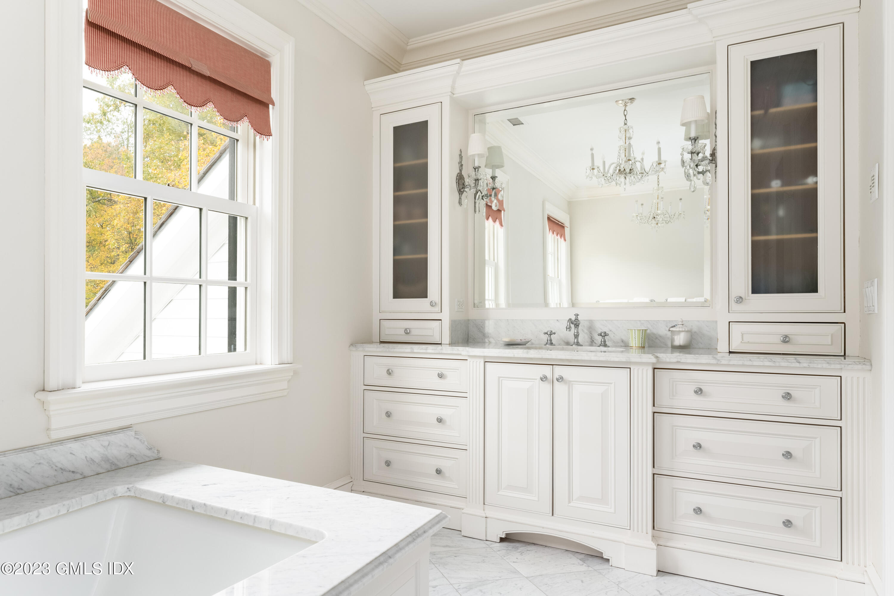 6 Hill Road Greenwich, CT 06830 - Photo 18 of 35 a bathroom with a granite countertop sink and a window