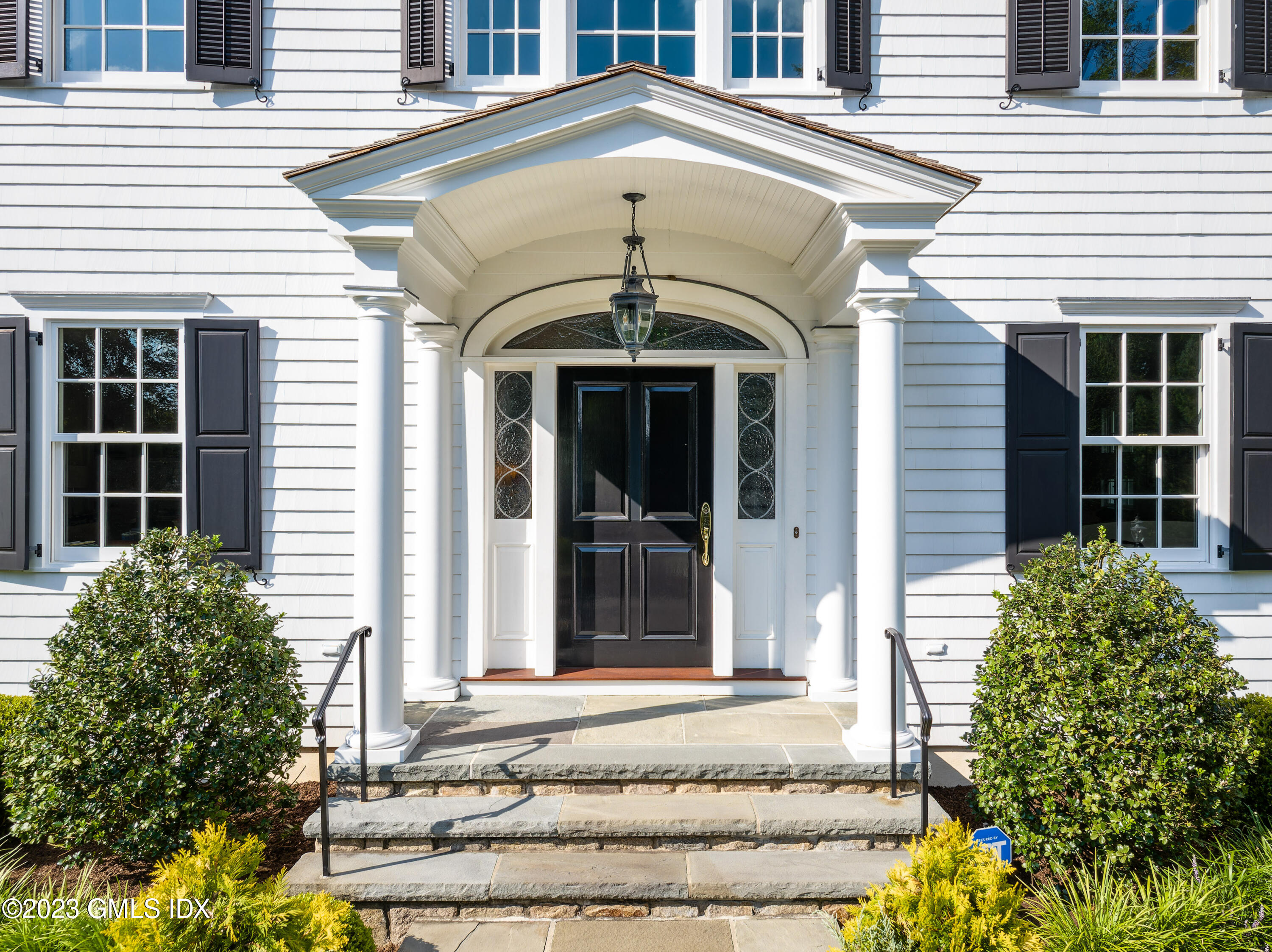 6 Hill Road Greenwich, CT 06830 - Photo 30 of 35 a front view of a house