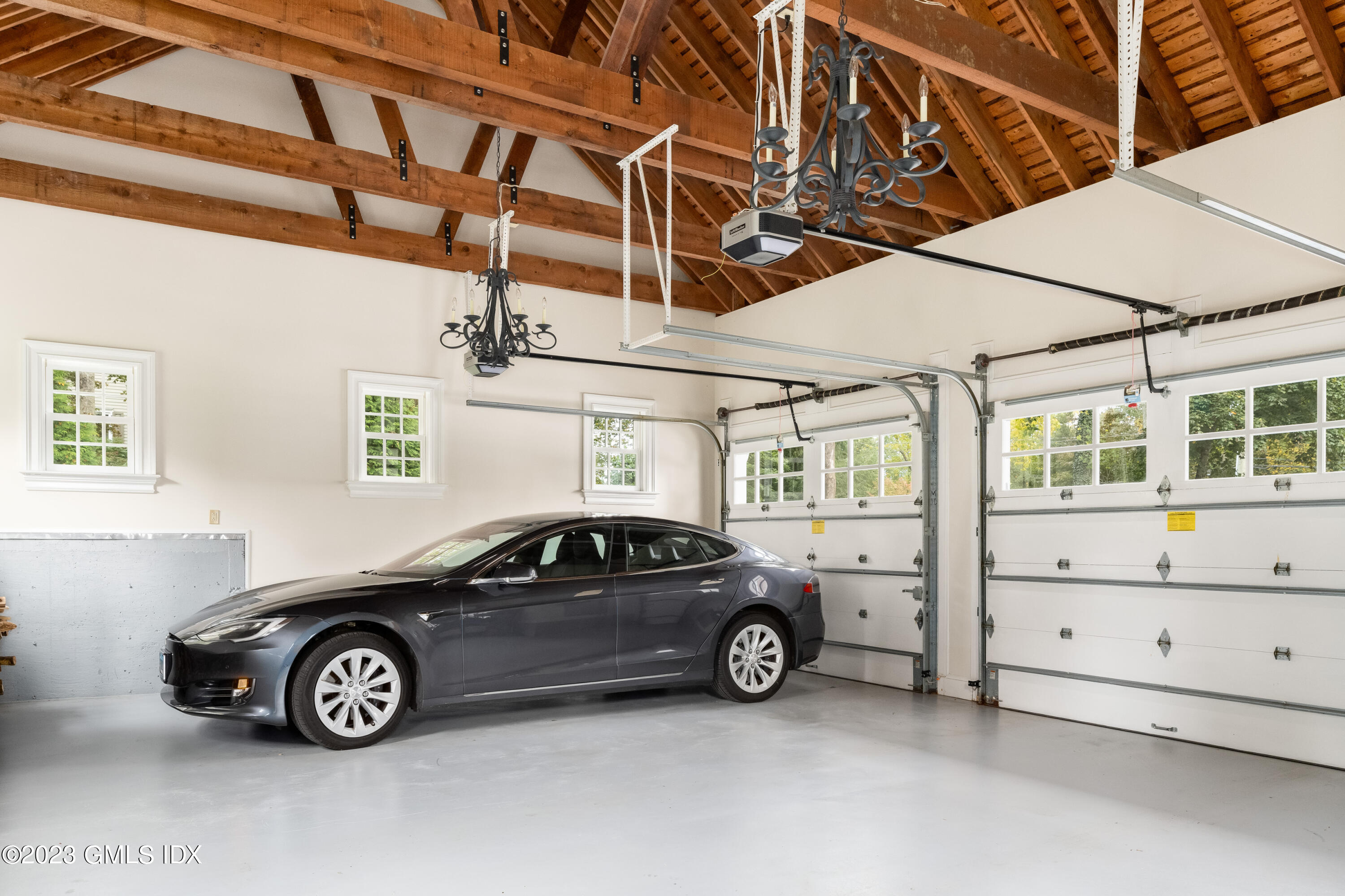 6 Hill Road Greenwich, CT 06830 - Photo 31 of 35 a view of a car in front of a house