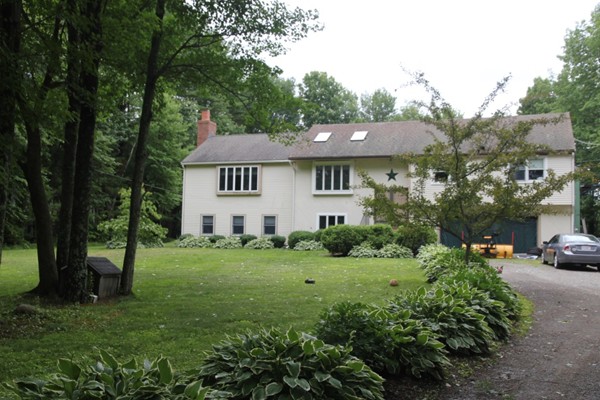 86 Highland Road Merrimac, MA 01860 - Photo 1 of 12 a view of backyard of house with green space
