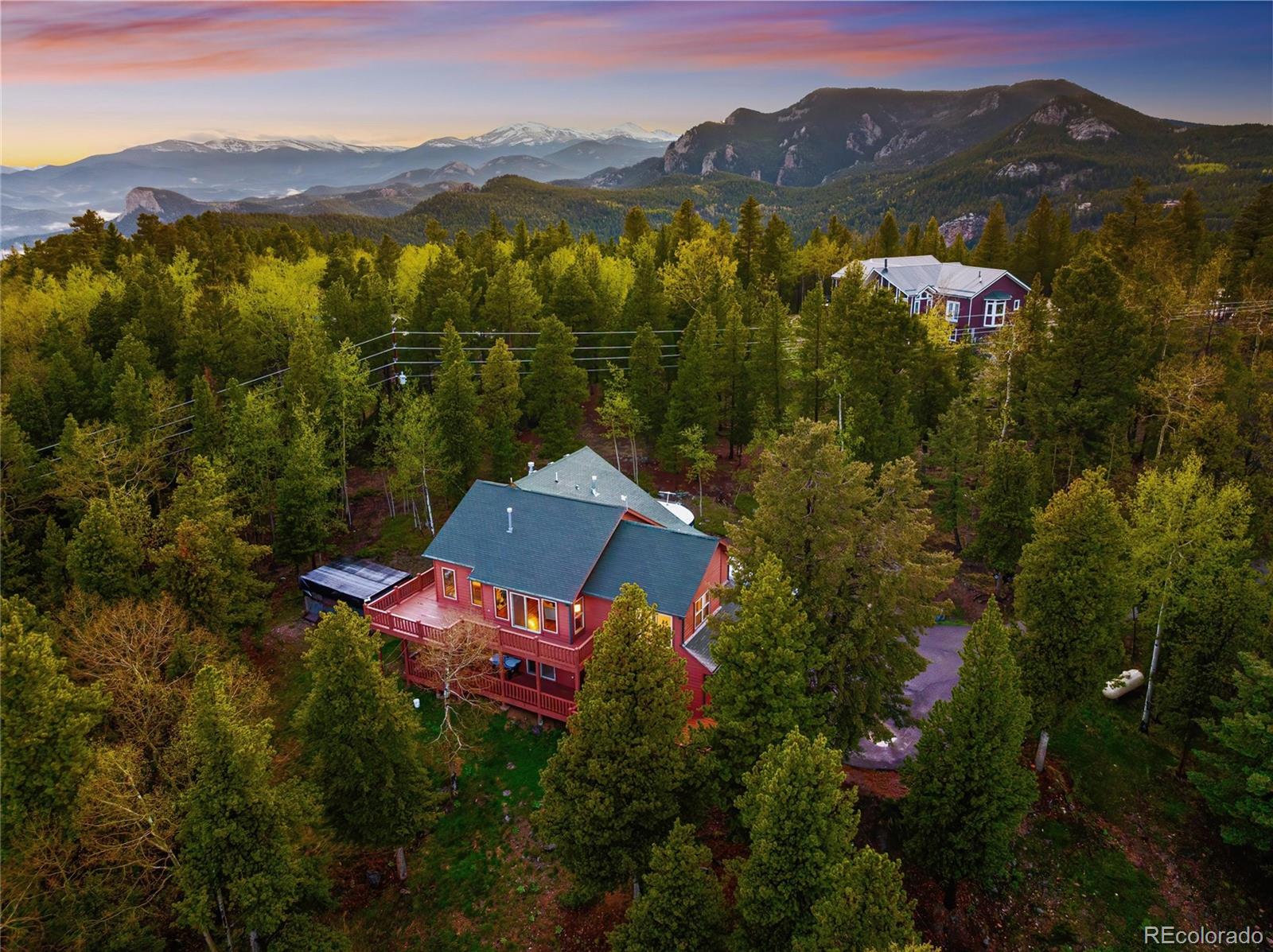 11163 Conifer Mountain Road Conifer, CO 80433 - Photo 42 of 46 a view of a mountain with a lake