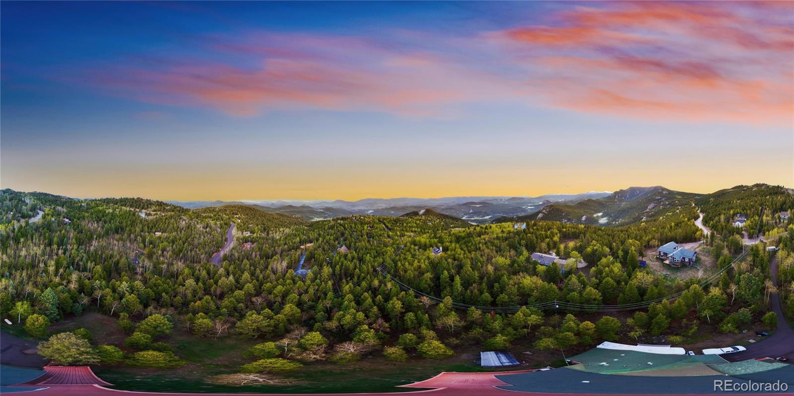 11163 Conifer Mountain Road Conifer, CO 80433 - Photo 44 of 46 a view of a city with sunset view