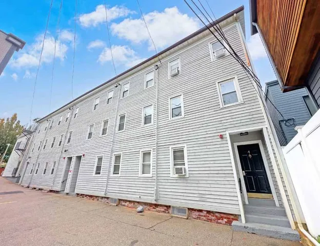 a view of city street with cars