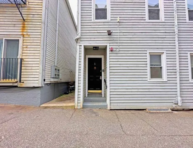 a car parked in front of a house