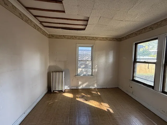 a view of empty room with windows