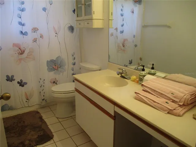 a bathroom with a sink and toilet