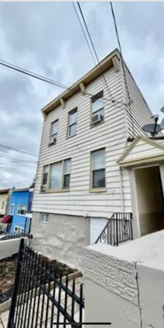 a view of a house with a roof deck