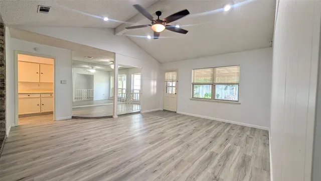 a view of a room with racks on the wall