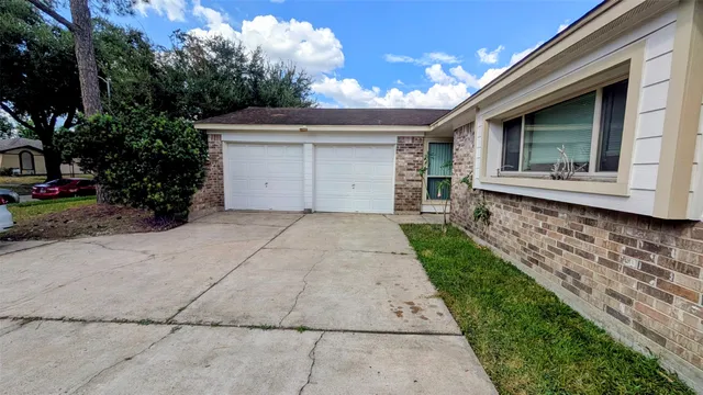 a view of a house with a garden