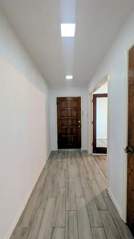 a kitchen with stainless steel appliances granite countertop a stove and a refrigerator
