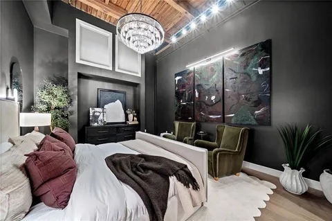 a kitchen with stainless steel appliances kitchen island granite countertop a table and chairs