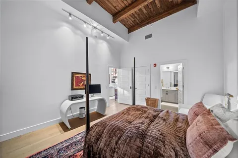 a view of parking garage with cars