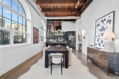 a view of a livingroom with furniture and a fireplace