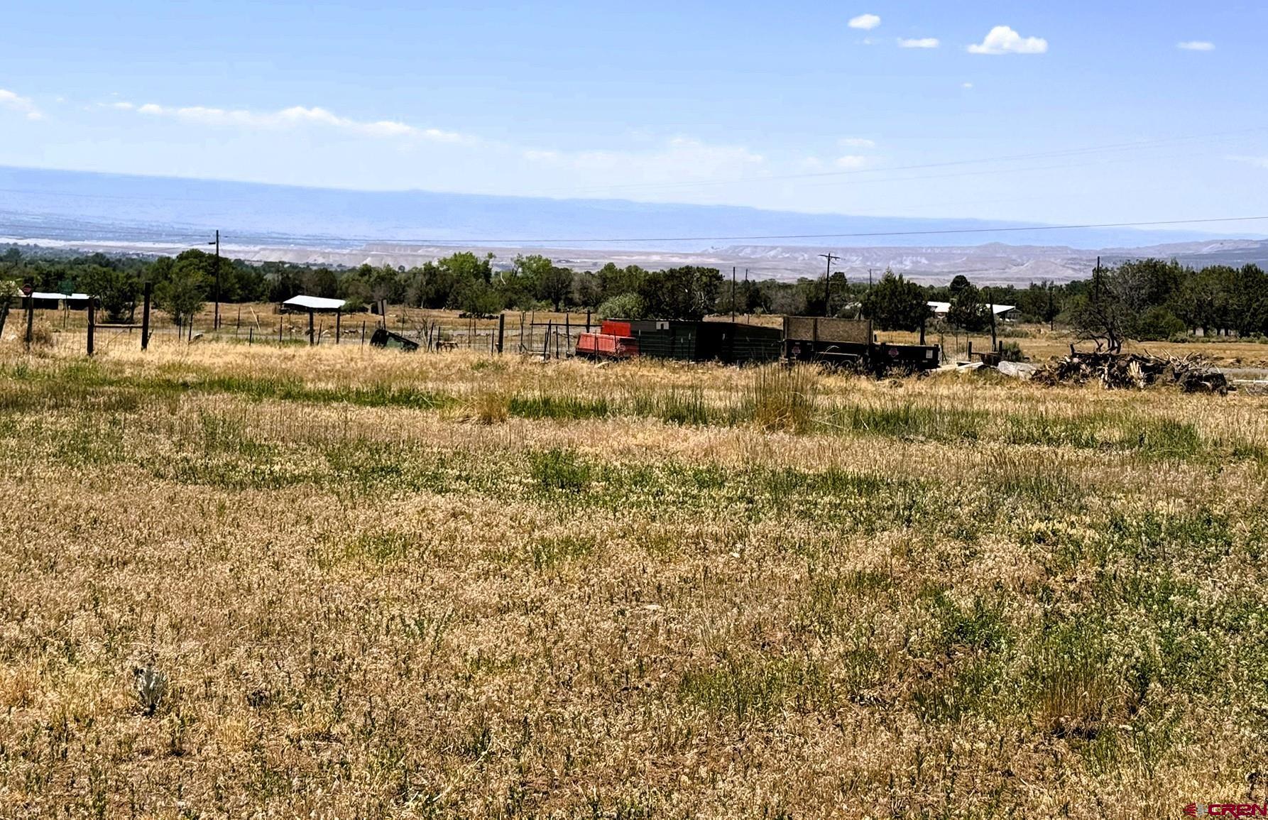 18358 Surface Creek Road Cedaredge, CO 81413 - Photo 14 of 26 a view of lake with and mountain