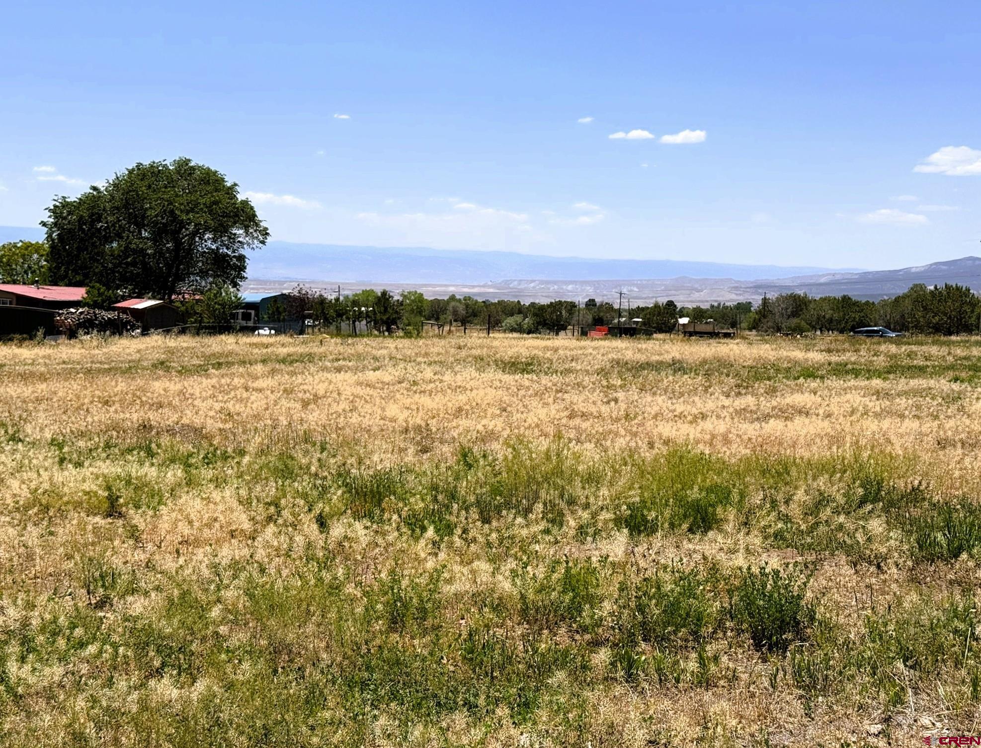 18358 Surface Creek Road Cedaredge, CO 81413 - Photo 16 of 26 a view of lake and mountain