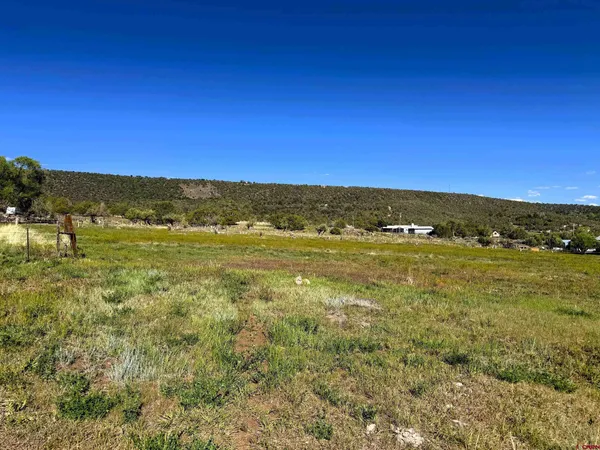 a view of an ocean and a mountain