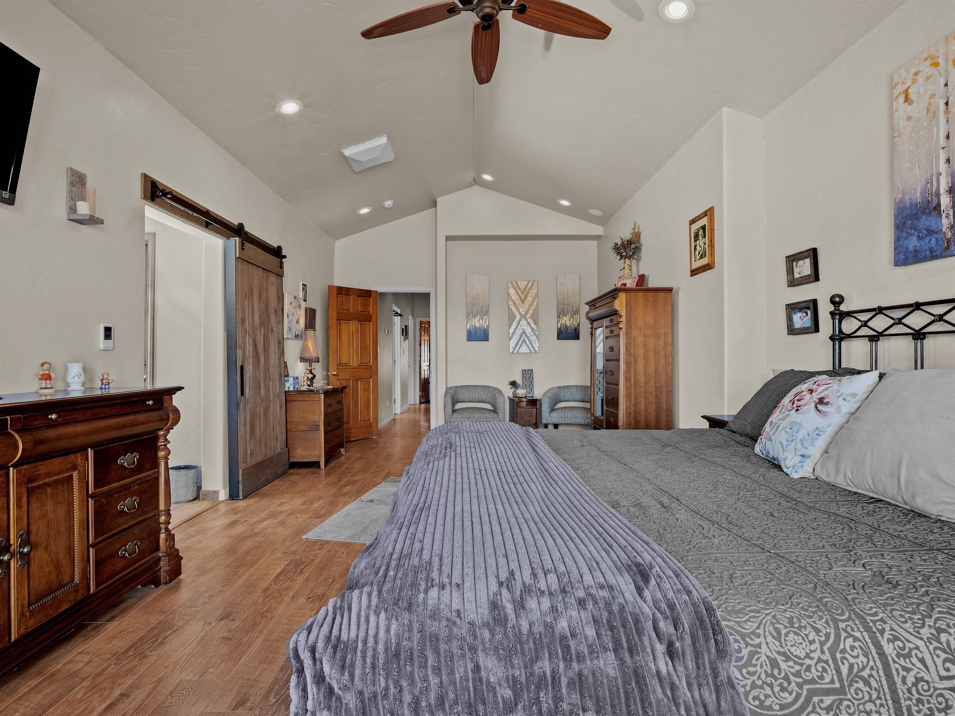 2111 Desert Hill Road Grand Junction, CO 81507 - Photo 19 of 34 a bed room with a bed and a television