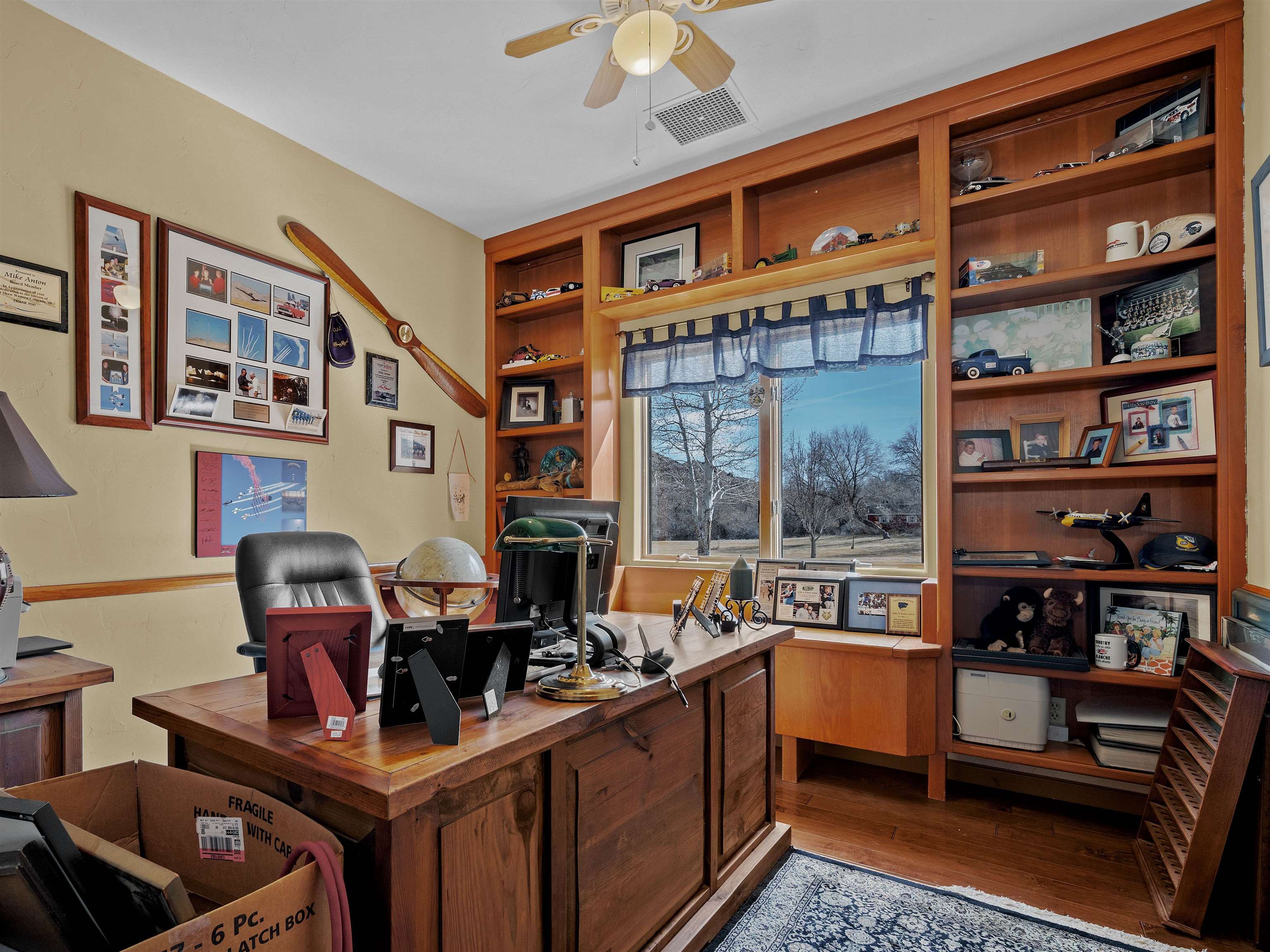 2111 Desert Hill Road Grand Junction, CO 81507 - Photo 21 of 34 a room with furniture cabinets and window