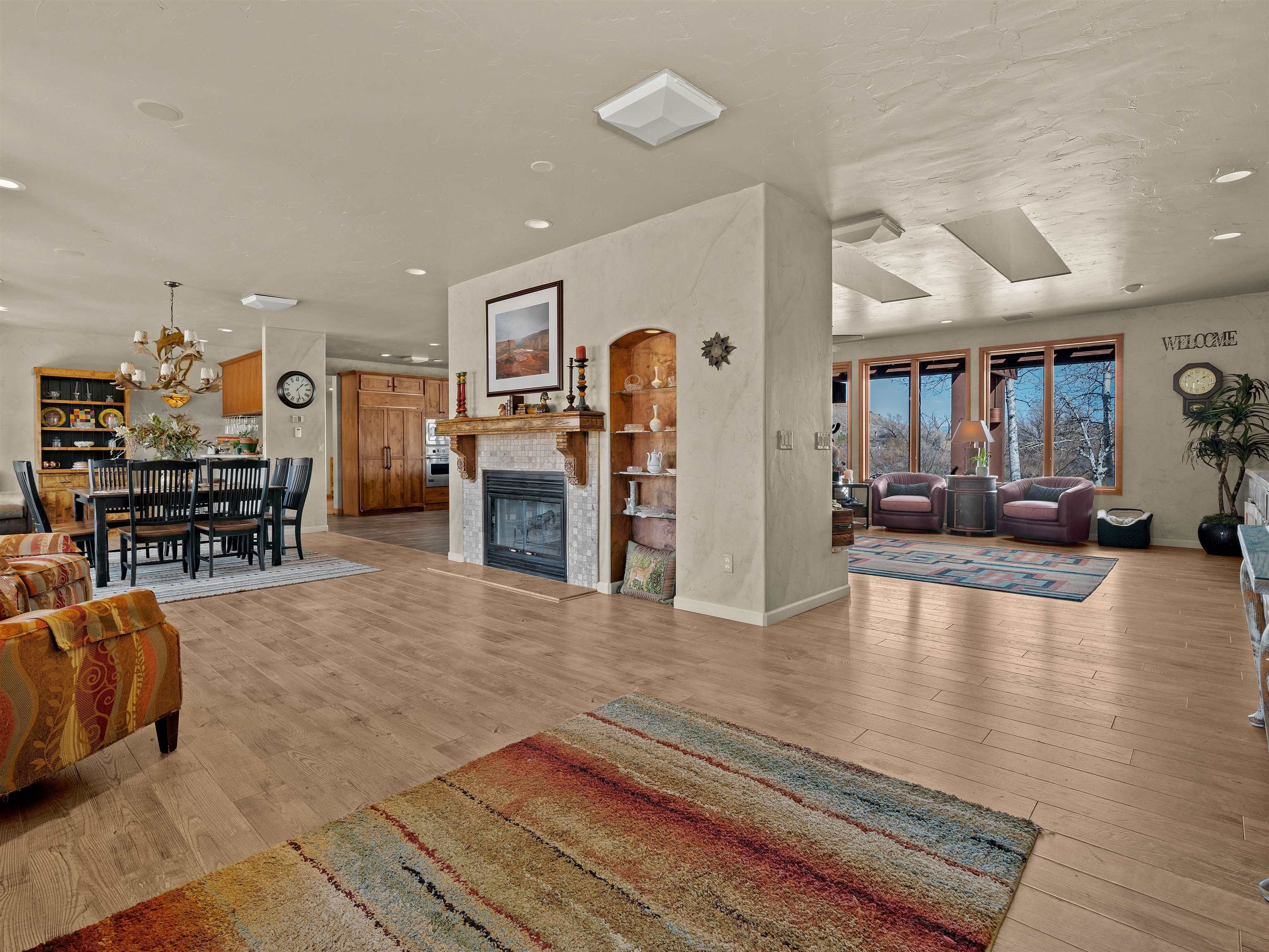 2111 Desert Hill Road Grand Junction, CO 81507 - Photo 6 of 34 a living room with furniture and view of kitchen