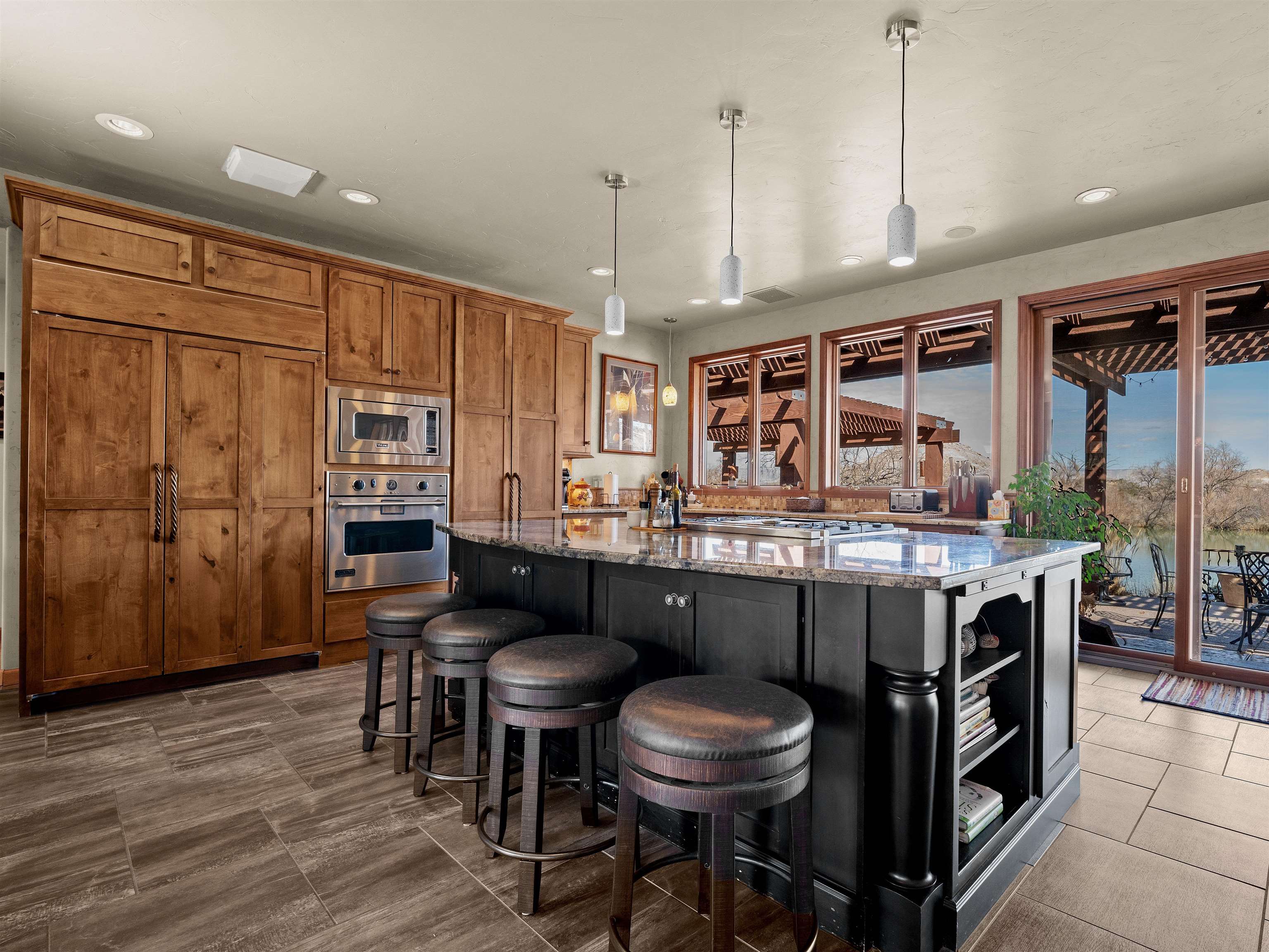 2111 Desert Hill Road Grand Junction, CO 81507 - Photo 10 of 34 a kitchen with a table chairs and wooden floor