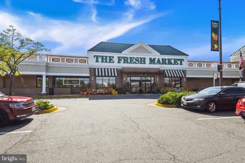 a view of a car park in front of a building