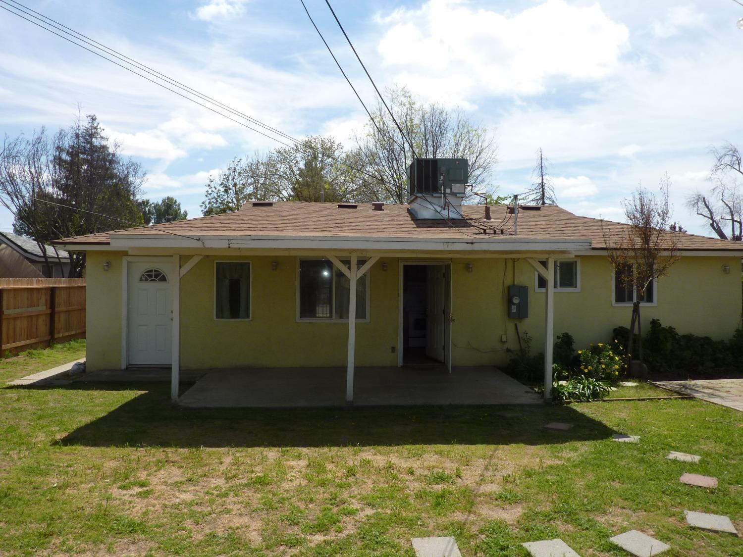 2629 East Richert Avenue Fresno, CA 93726 - Photo 30 of 32 a front view of house with yard