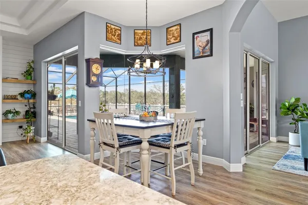 a bedroom with a bed and a potted plant