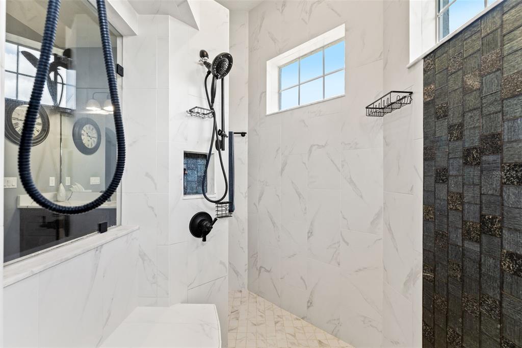 12277 Eskimo Curlew Road Weeki Wachee, FL 34614 - Photo 33 of 84 a bathroom with a sink toilet and shower