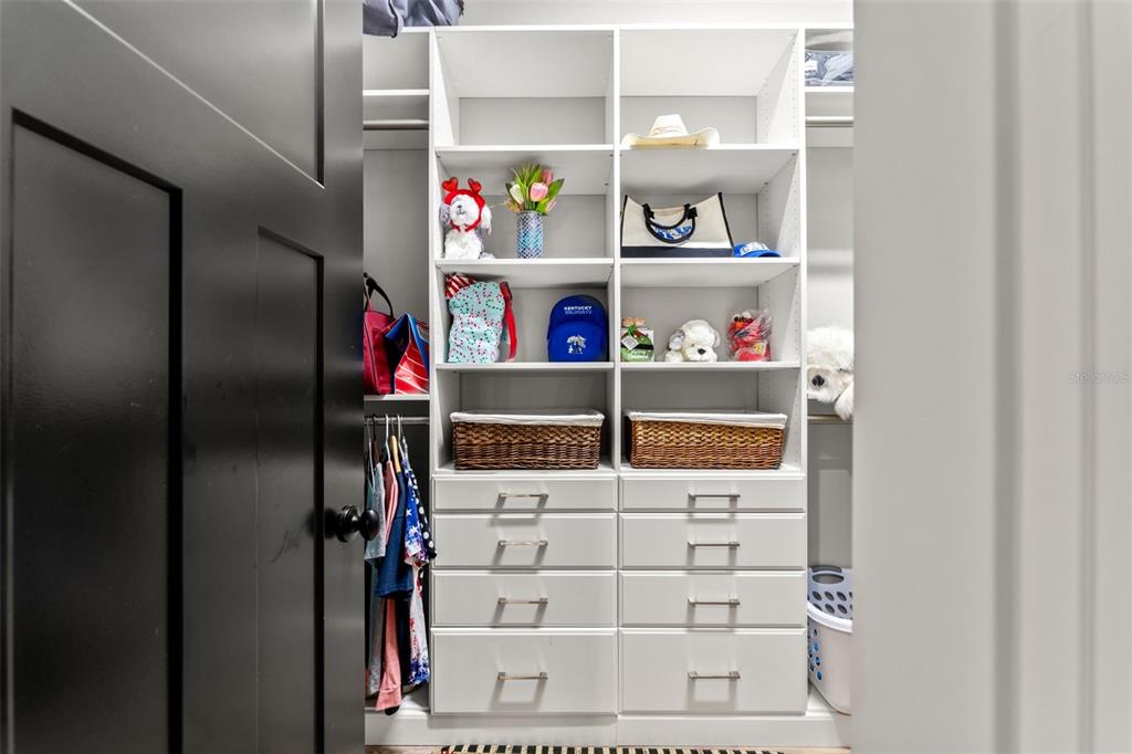 12277 Eskimo Curlew Road Weeki Wachee, FL 34614 - Photo 35 of 84 a room with storage and utility