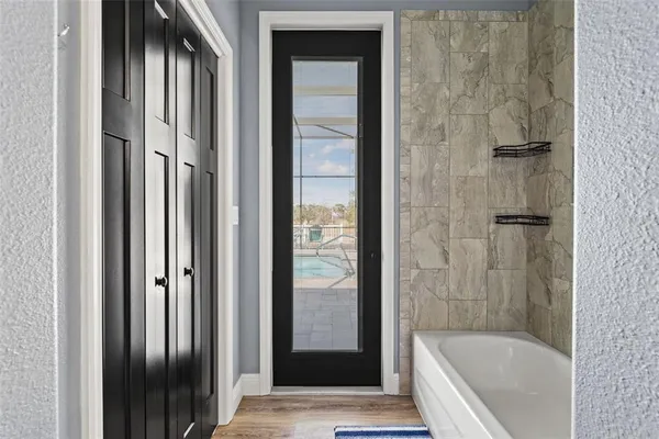 a view of a lake with a house in the background