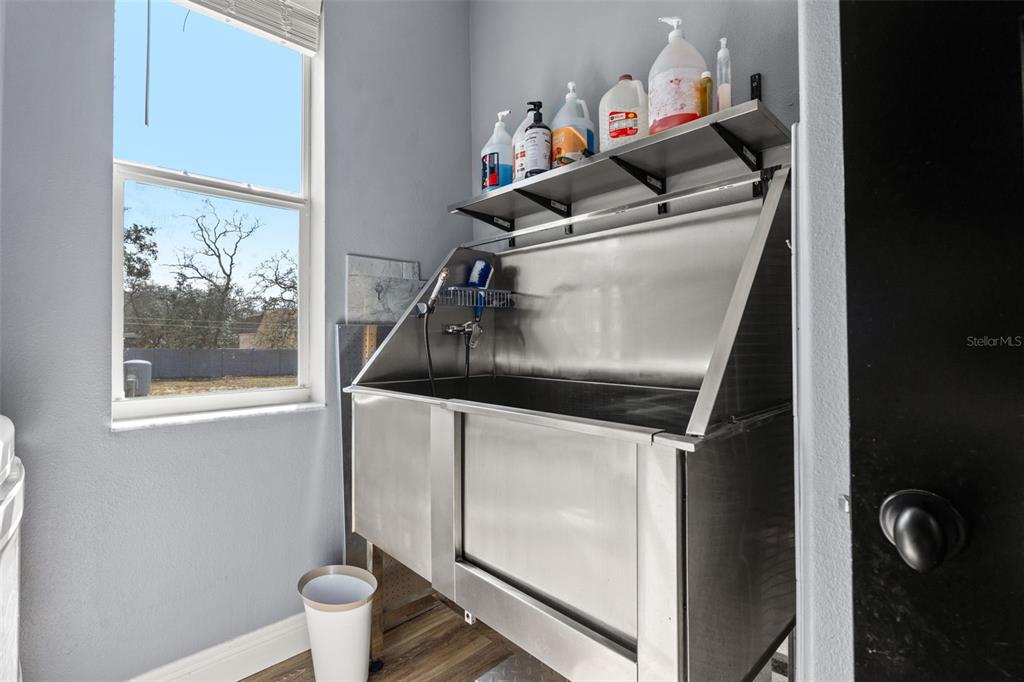 12277 Eskimo Curlew Road Weeki Wachee, FL 34614 - Photo 53 of 84 a utility room with dryer and washer