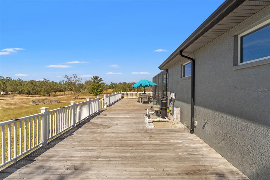 12277 Eskimo Curlew Road Weeki Wachee, FL 34614 - Photo 64 of 84 a view of outdoor space with yard and ocean view