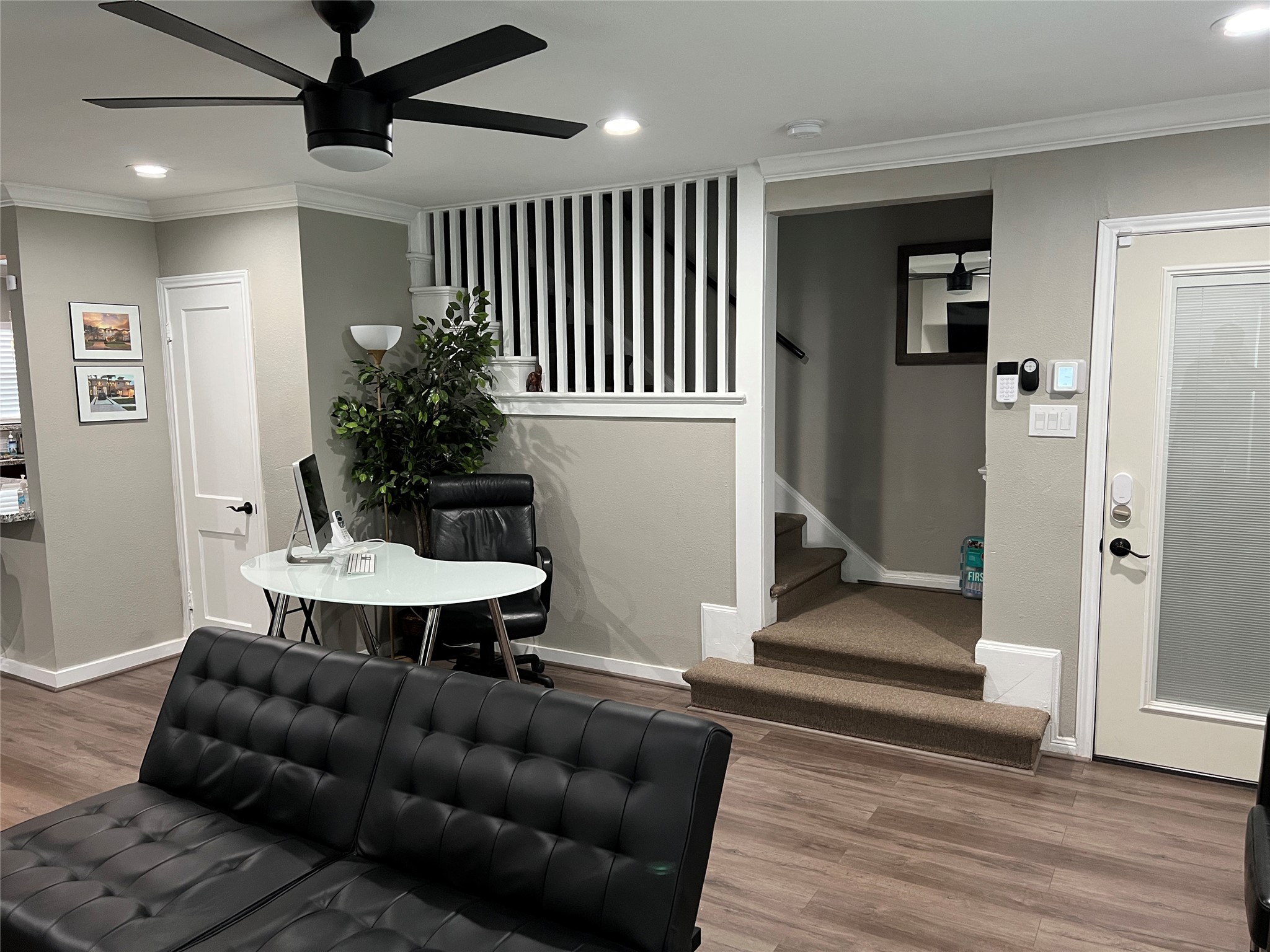 1909 Ruth Street Houston, TX 77004 - Photo 23 of 35 a living room with furniture and a potted plant