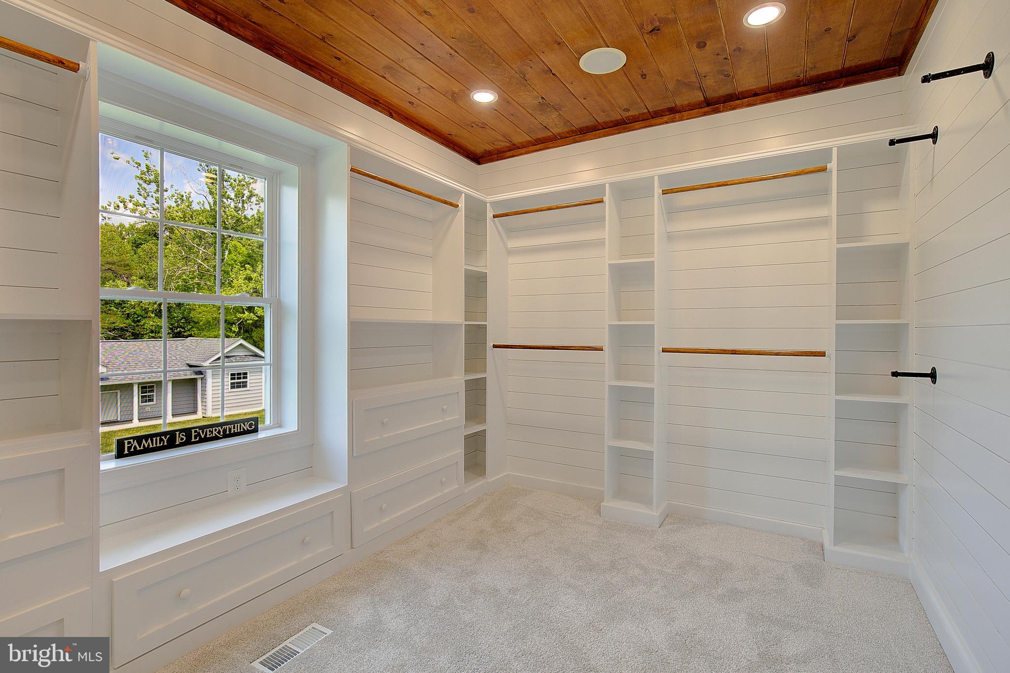 2393 Garrity Road St. Leonard, MD 20685 - Photo 31 of 76 Spacious custom closet with built-in storage.