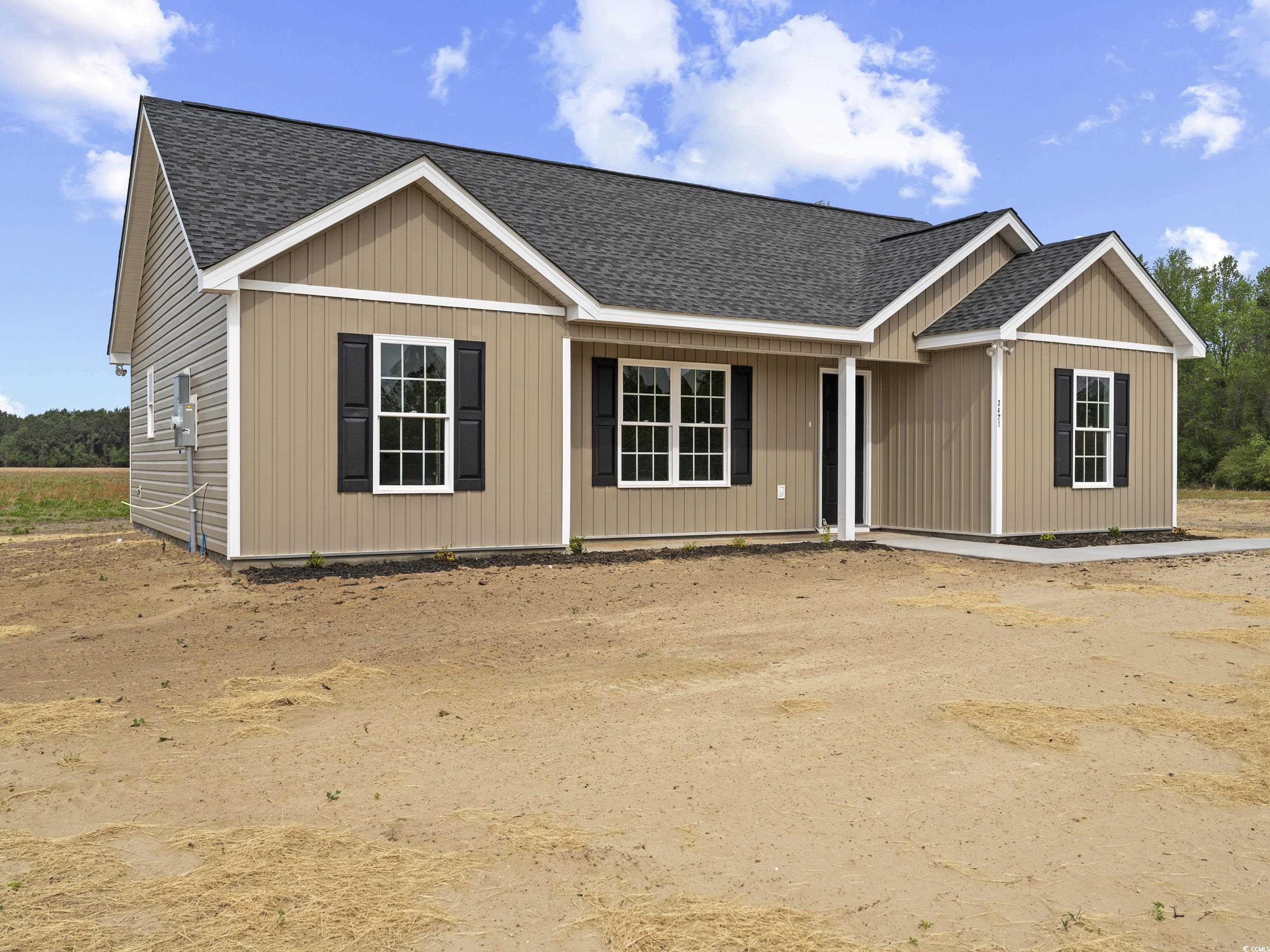 3421 B And S Road Loris, SC 29569 - Photo 2 of 26 View of front of home featuring roof with shingles