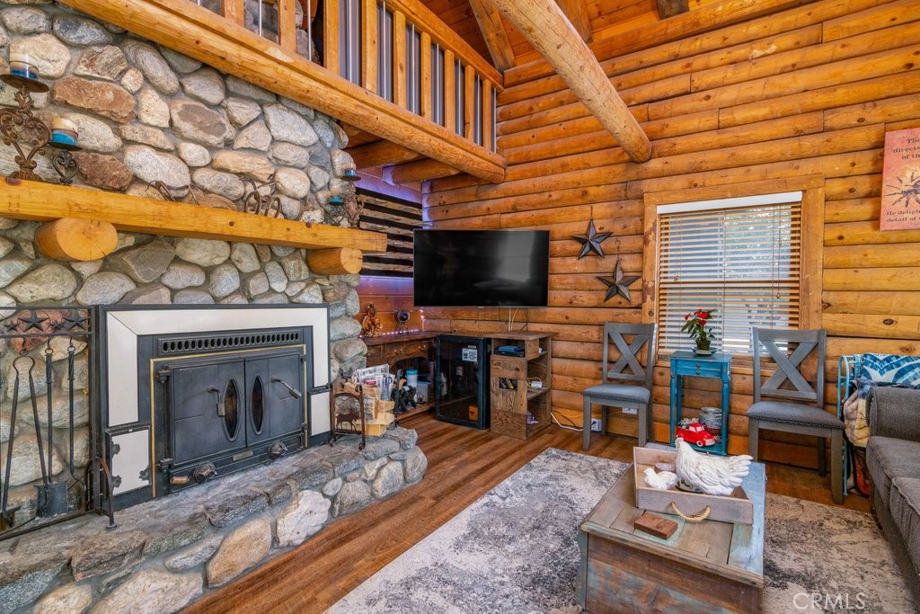 37325 Bohlen Road Anza, CA 92539 - Photo 12 of 43 a living room with fireplace furniture and a flat screen tv