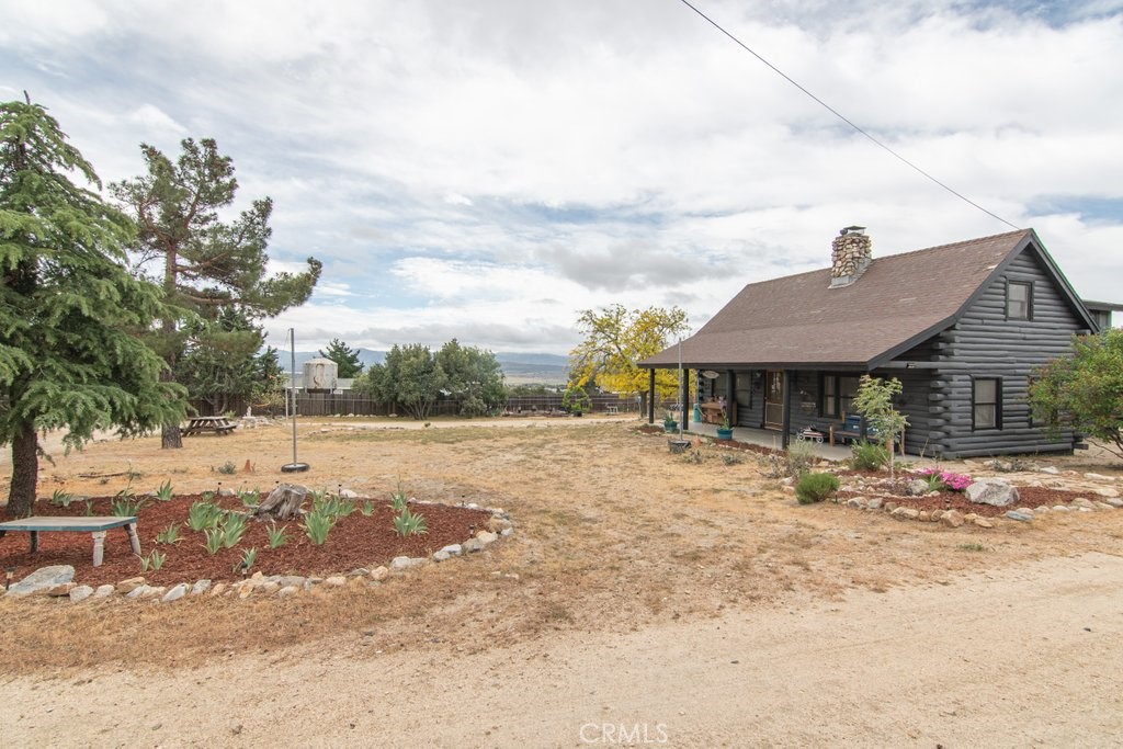 37325 Bohlen Road Anza, CA 92539 - Photo 2 of 43 a front view of a house with a yard