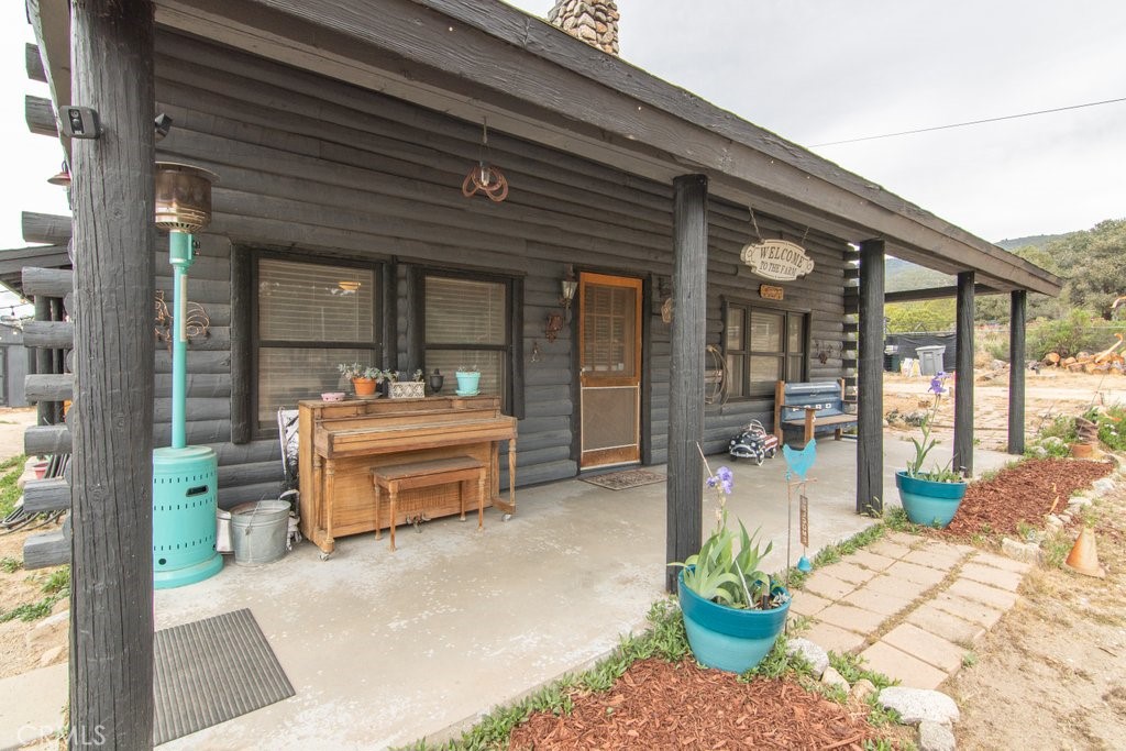 37325 Bohlen Road Anza, CA 92539 - Photo 9 of 43 a front view of a house with outdoor seating