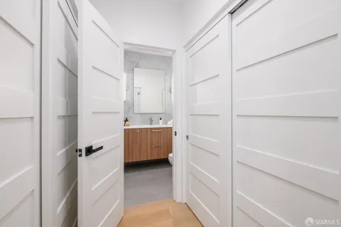 a view of bathroom and shower