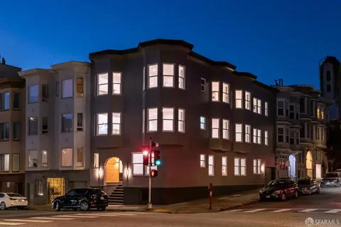 a front view of a building with a street