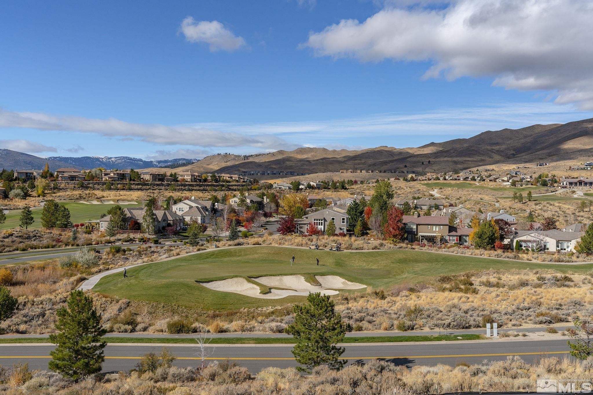 1765 Boulder Ridge Court Reno, NV 89523 - Photo 33 of 36 a view of a lake with a mountain