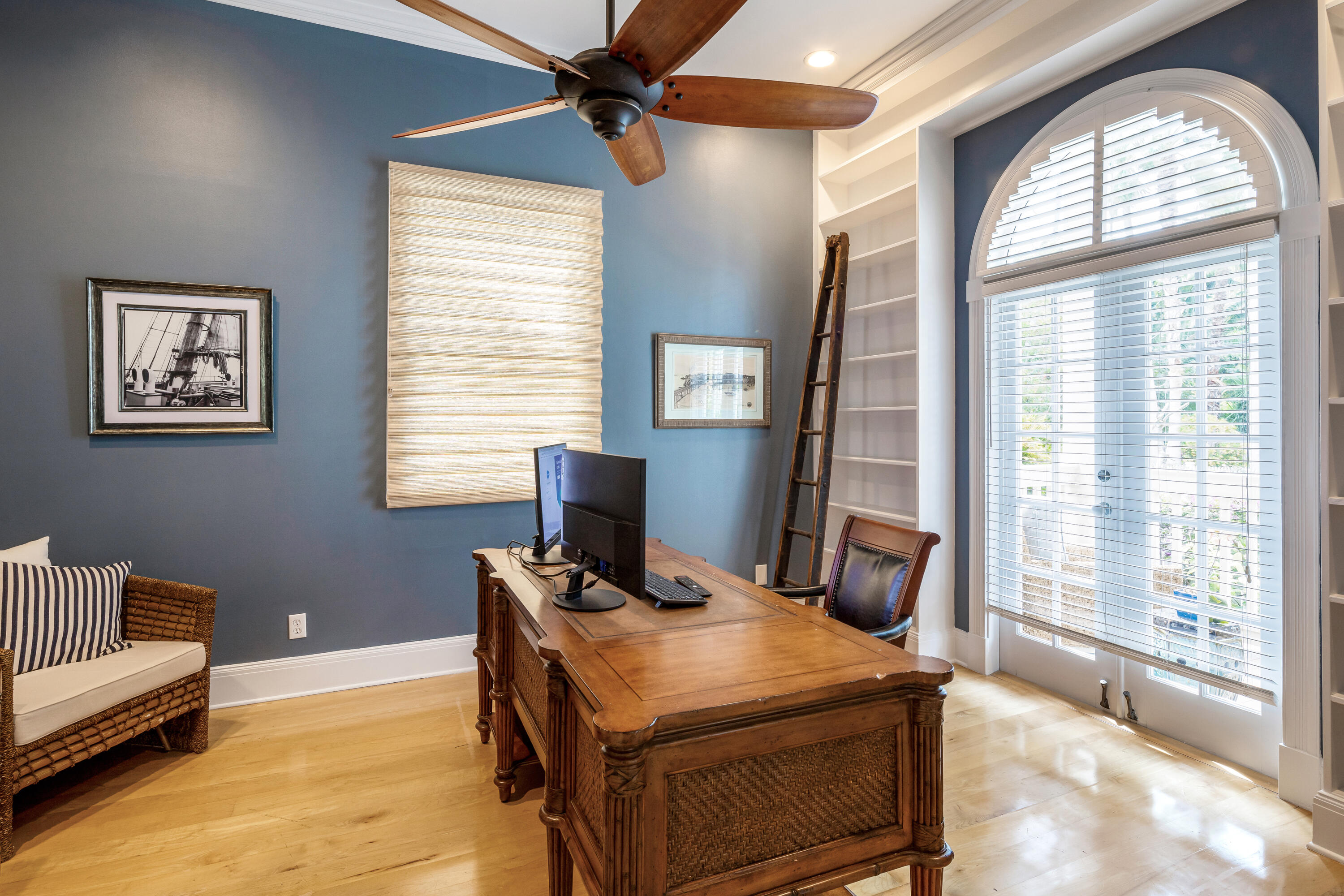64 Front Street Key West, FL 33040 - Photo 23 of 57 a room with furniture and a window