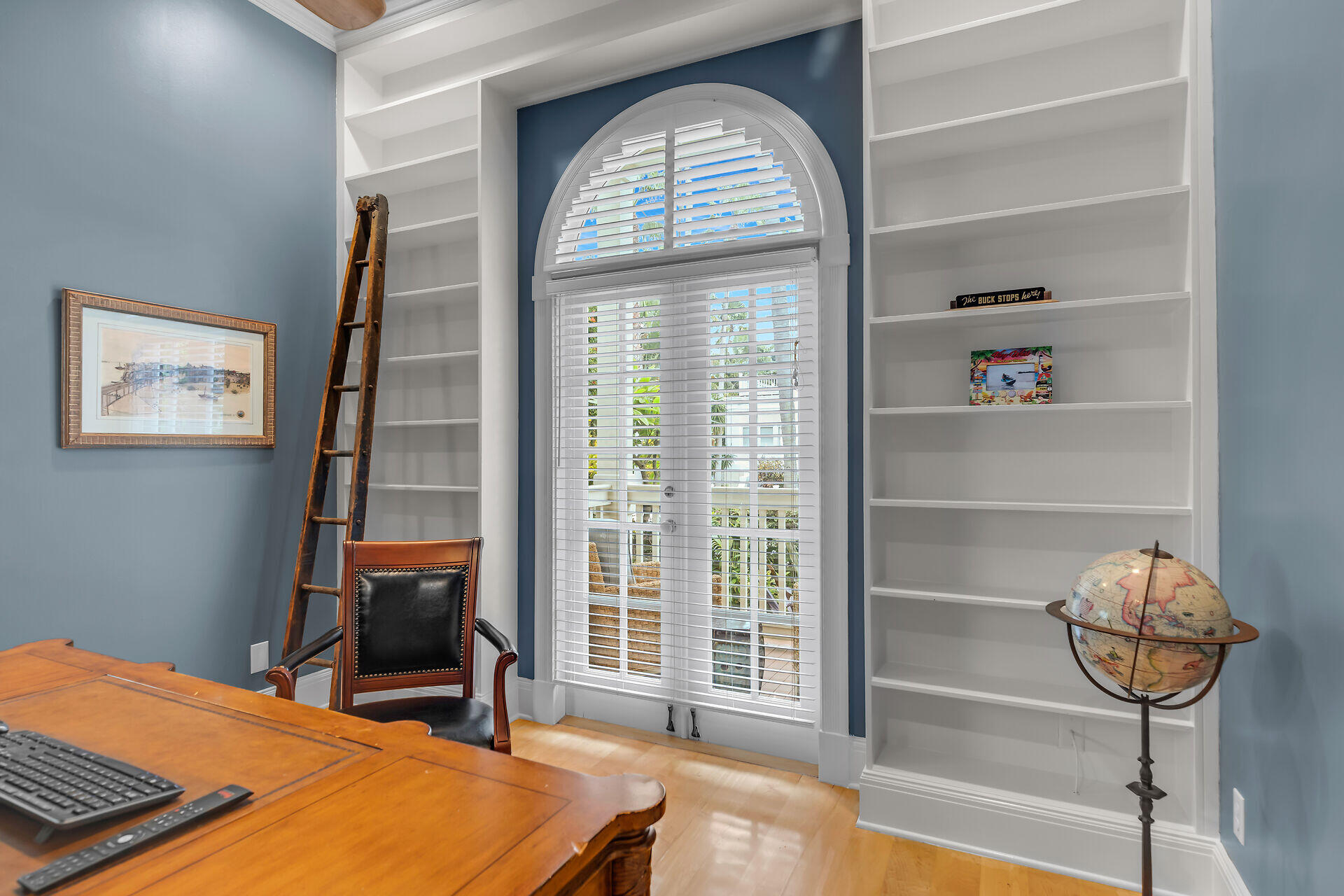 64 Front Street Key West, FL 33040 - Photo 24 of 57 a bedroom with a bed and a chandelier