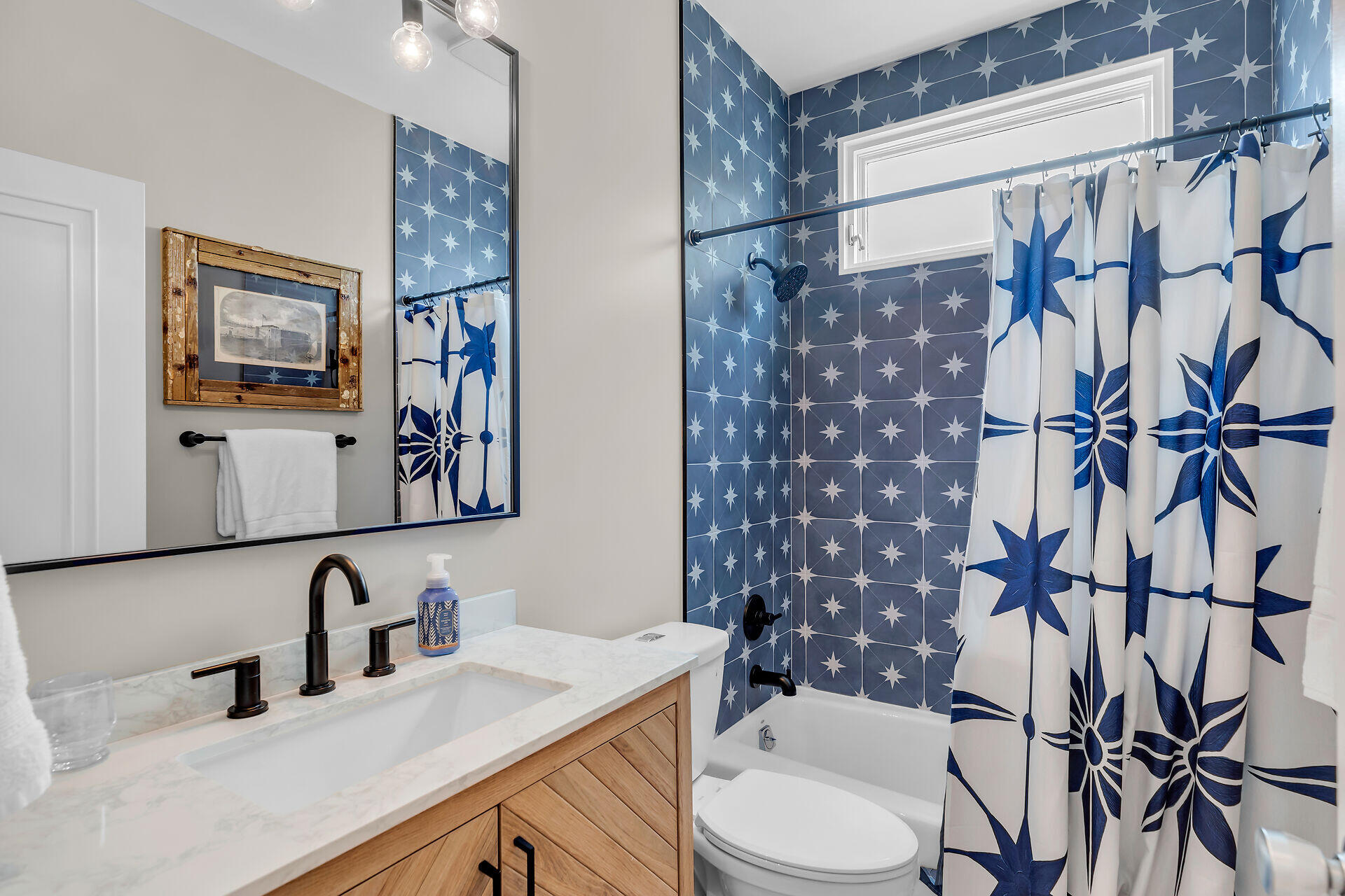 64 Front Street Key West, FL 33040 - Photo 36 of 57 a bathroom with a sink toilet and shower