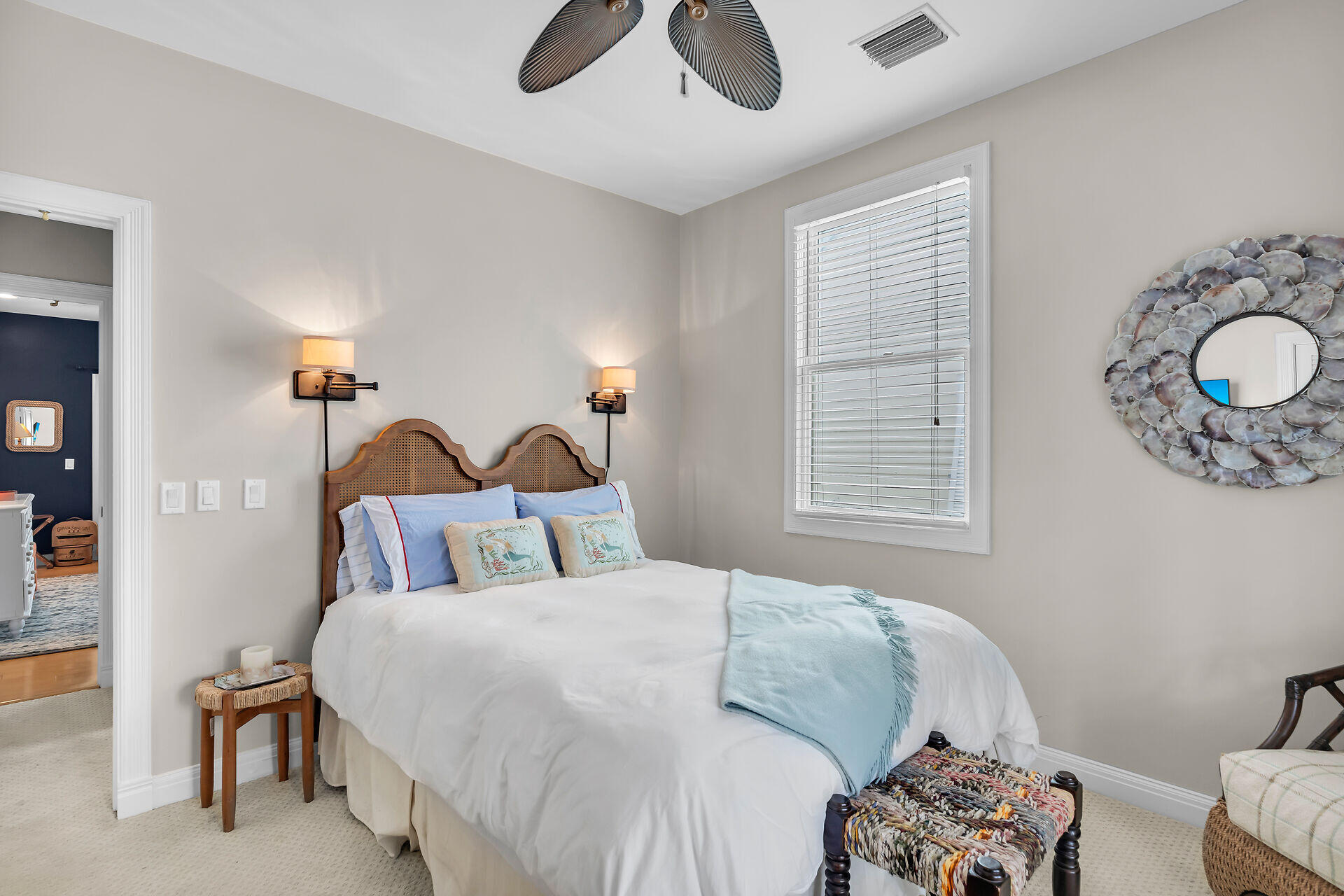 64 Front Street Key West, FL 33040 - Photo 38 of 57 a bedroom with a bed and a chandelier