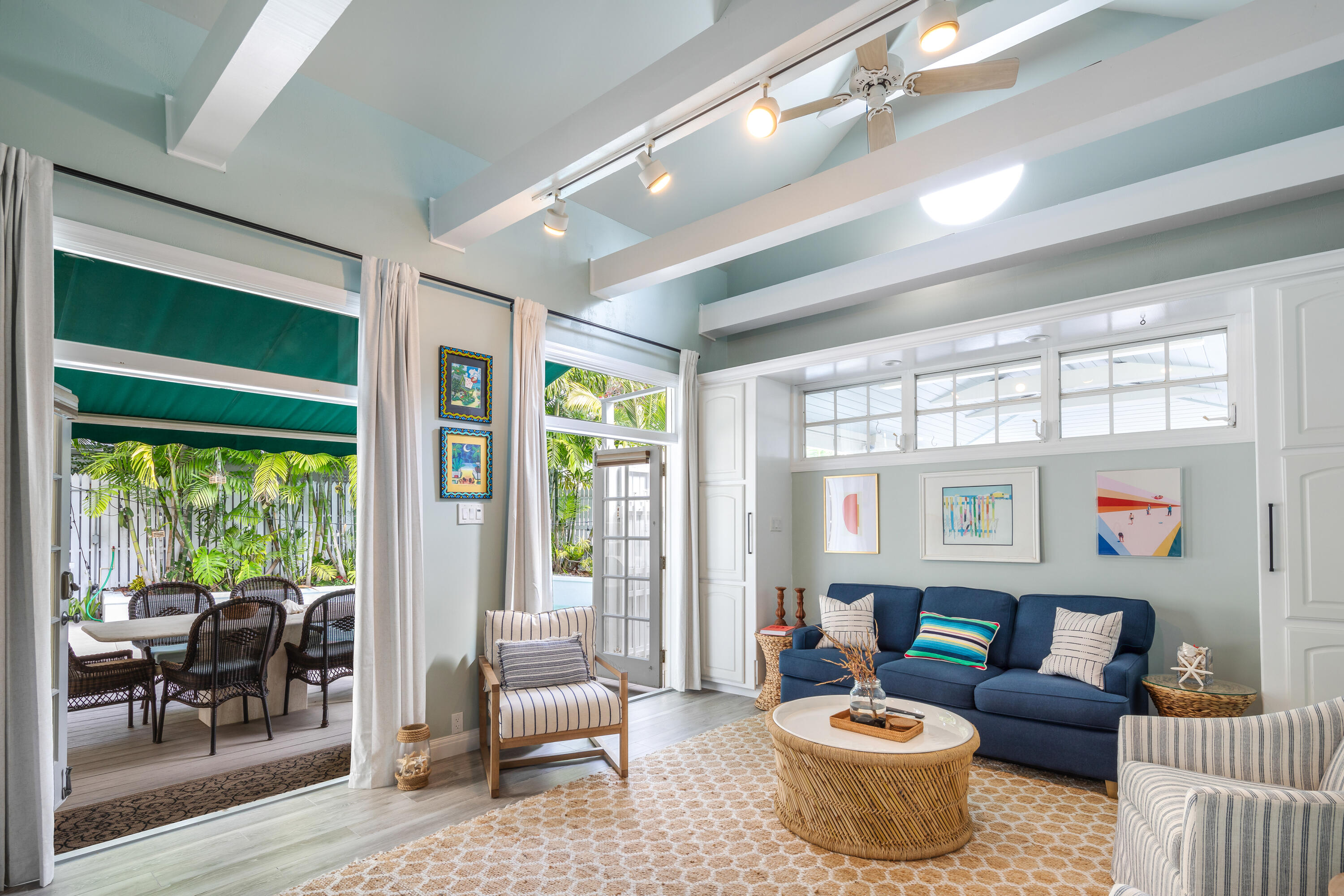 64 Front Street Key West, FL 33040 - Photo 46 of 57 a living room with furniture and a large window