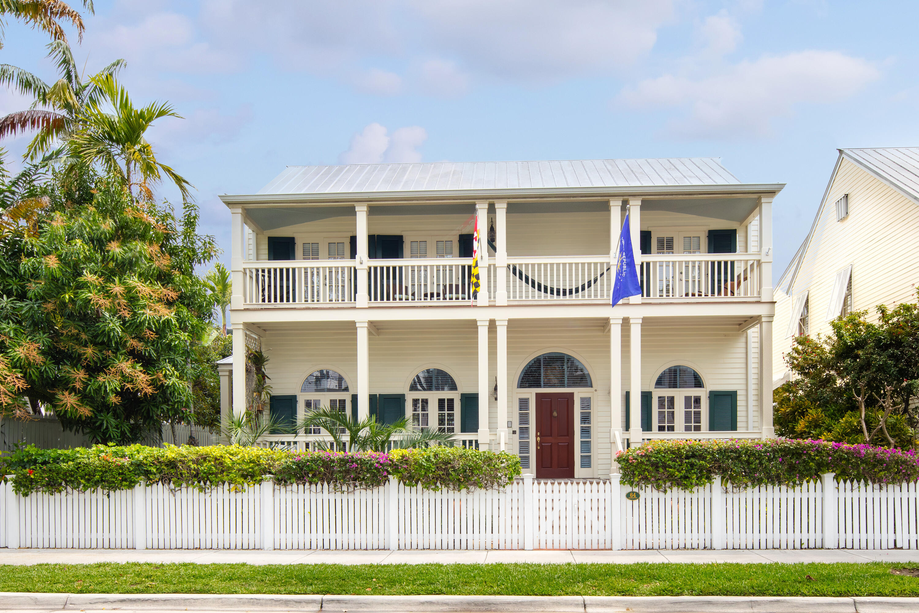 64 Front Street Key West, FL 33040 - Photo 5 of 57 a front view of house with yard