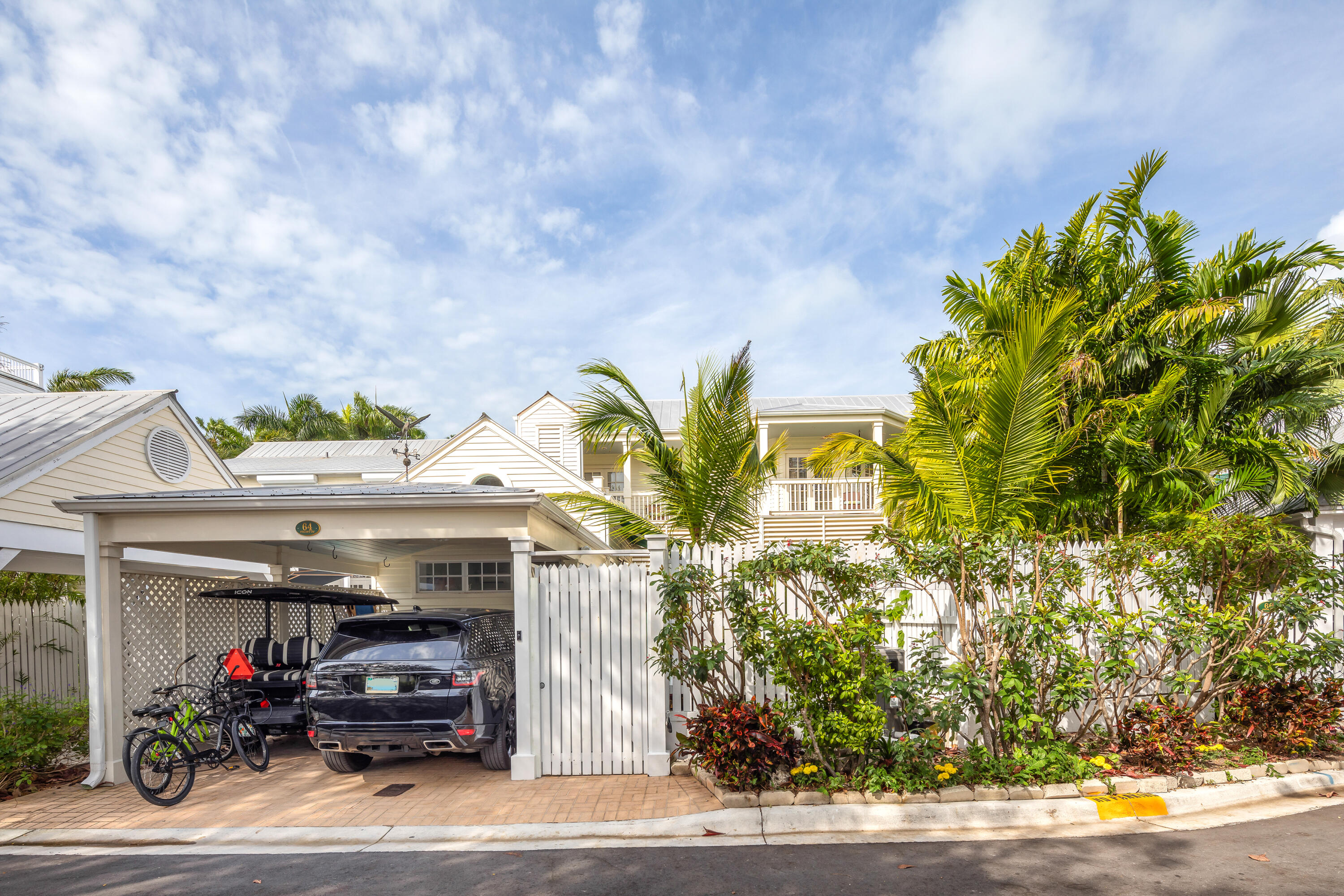 64 Front Street Key West, FL 33040 - Photo 51 of 57 a view of a building and car parked