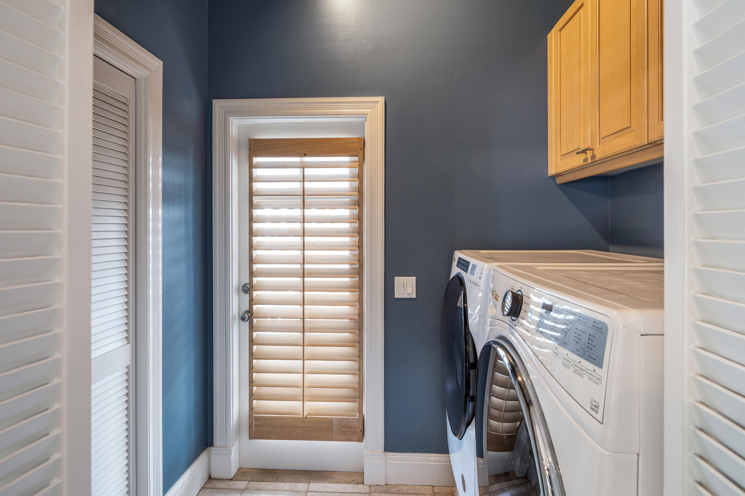 64 Front Street Key West, FL 33040 - Photo 54 of 57 a utility room with dryer and washer