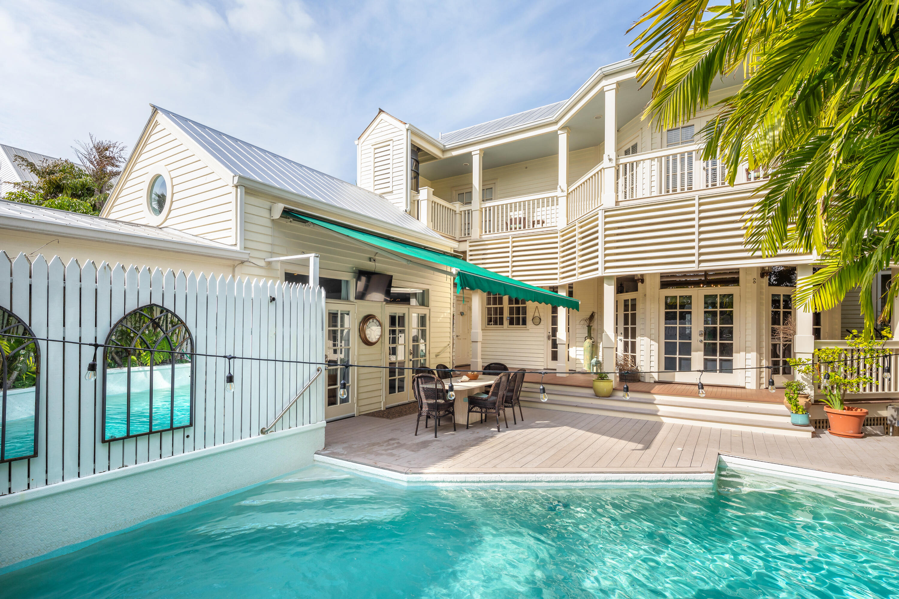 64 Front Street Key West, FL 33040 - Photo 56 of 57 a view of a building with a patio